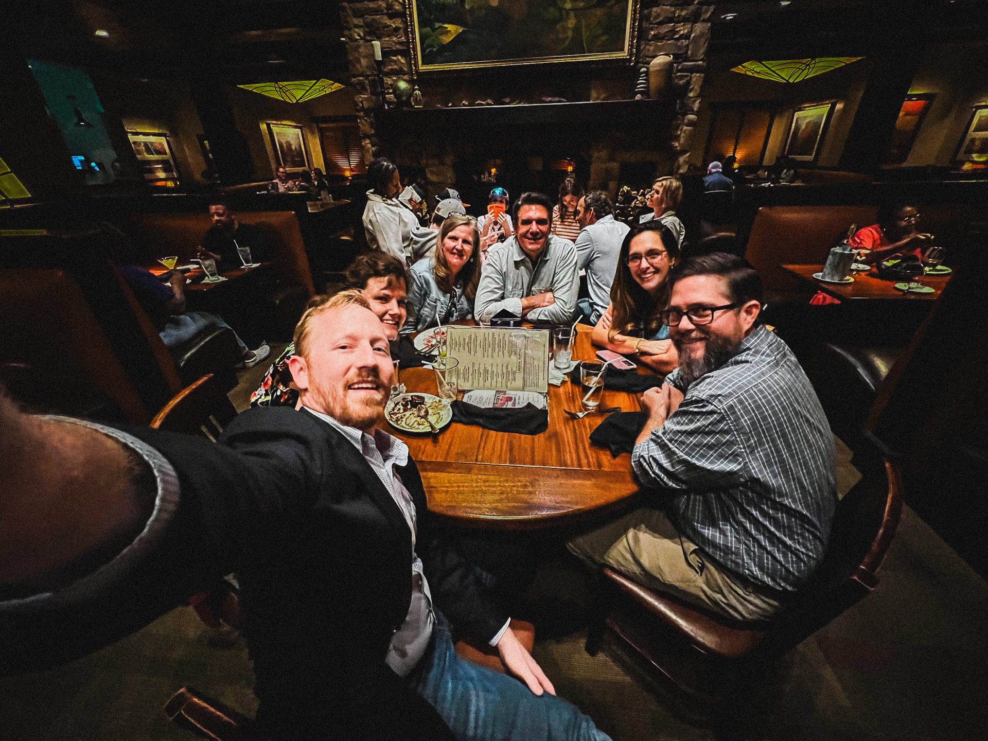 photo of Jen and Josh with the MediaMerge owner team at our interview