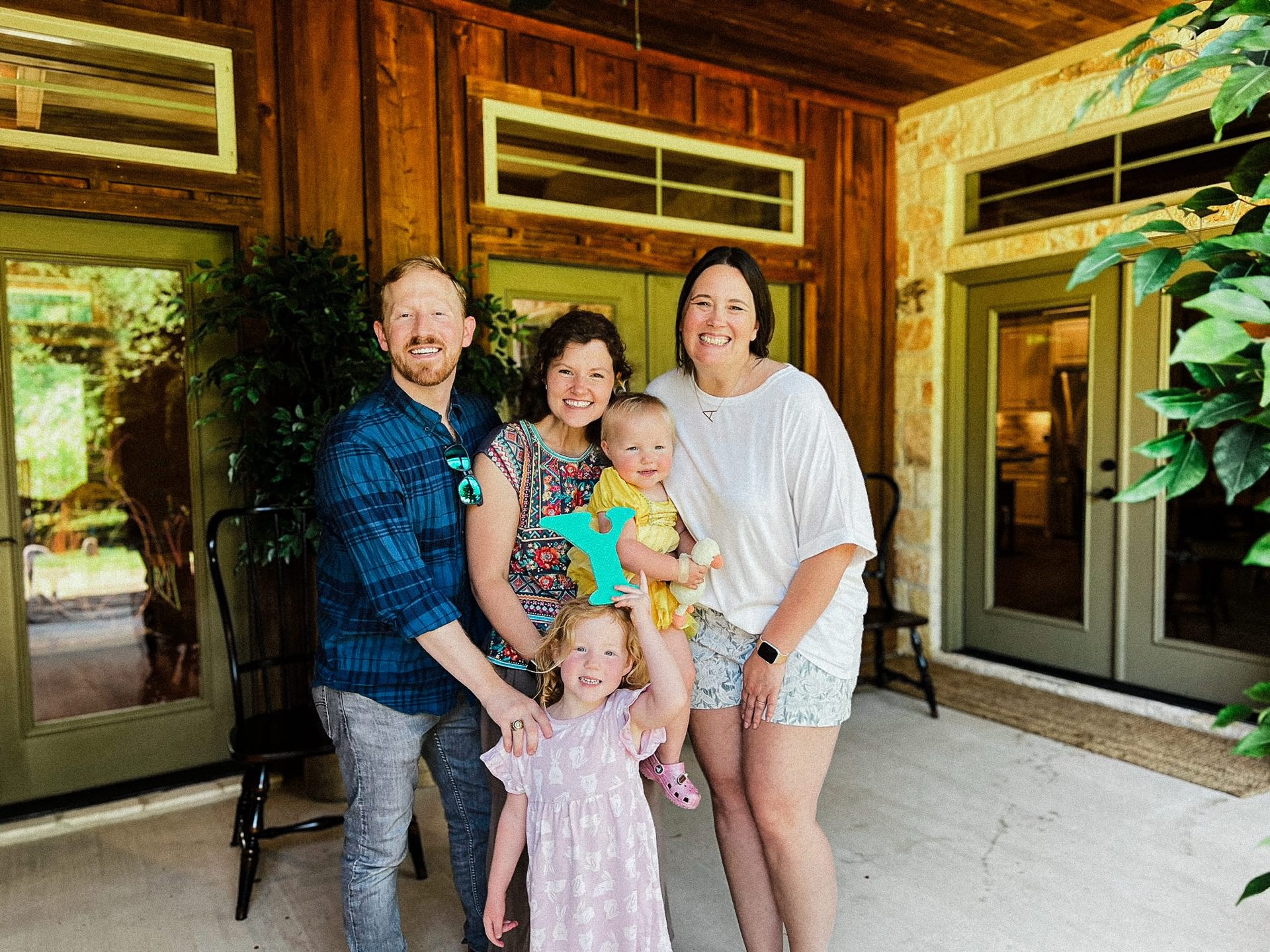 photo of Amber with our family after hosting our CSTX farewell gathering